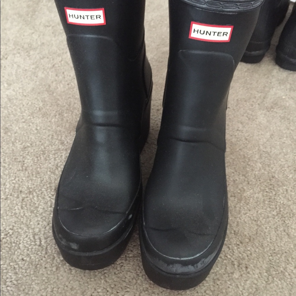 Wedged black hunter boots